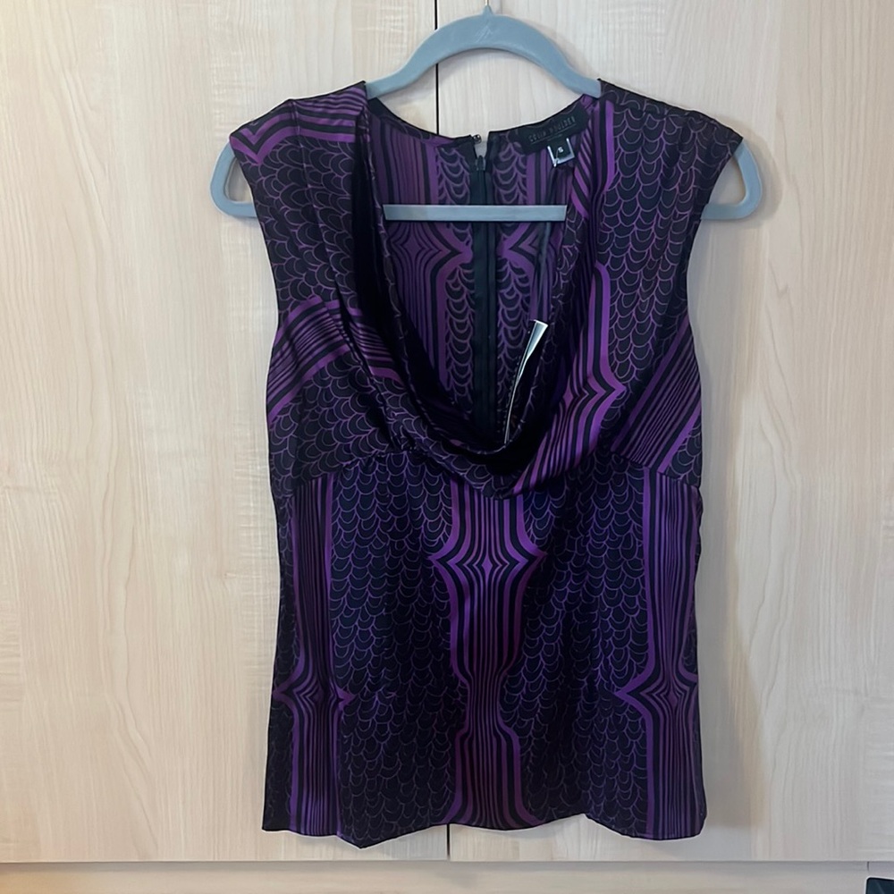 NWT, cowl-neck top. 100% silk. Size small. Purple/black deco print.